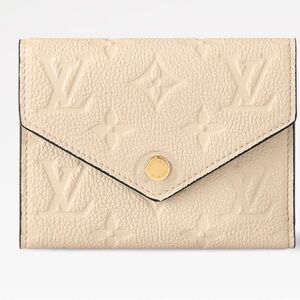 Louis Vuitton Victorine Empreinte Leather in “créme” wallet